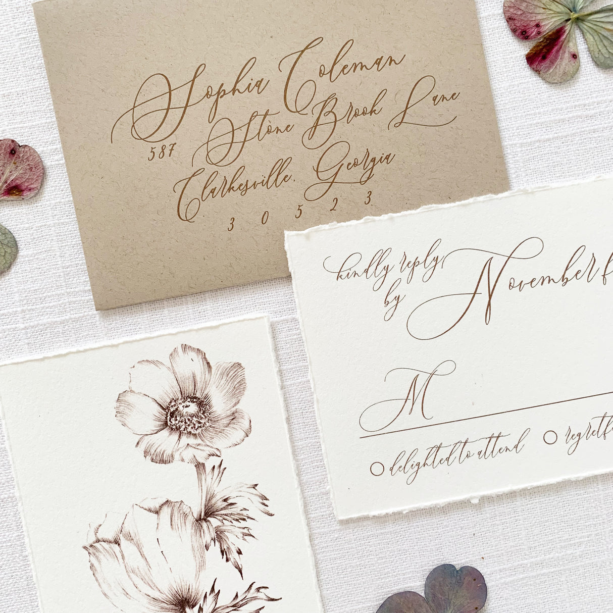 handtorn wedding rsvp cards printed on off white cardstock with vintage flower illustrations and natural khaki evnvelope