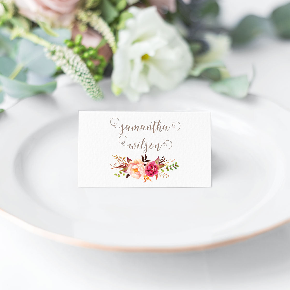 escort card featuring calligraphy script font and watercolor pink blush floral bouquet printed on off white cardstock